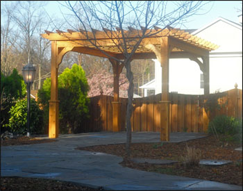 12 X 12 Cedar 4-Beam Pergola shown with 12" Top Runner Spacing and Clear Stain/Sealer