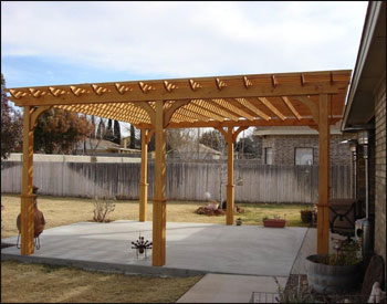16 x 20 Treated Pine 2-Beam Pergola with optional 36" tall post bases, top runner spacing of 6", and customers stain/sealer. 