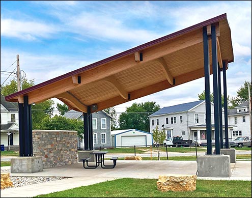 30 X 30 Lam-Wood Long Island Wave Bandshell Shown With Powder coated tube steel quad columns, and 26 gauge exposed fastener metal roofing