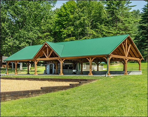 Custom 62 x 24 Red Cedar Herrington Ramada shown with 10 tall 7"x7" posts and Evergreen Metal Roof.