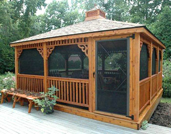 16 x 16 Cedar Rectangular Gazebo with Rustic Cedar Asphalt Shingles, Cupola, Decorative Braces and Optional 4 Track Windows, Cedar Stain and Offset Door 